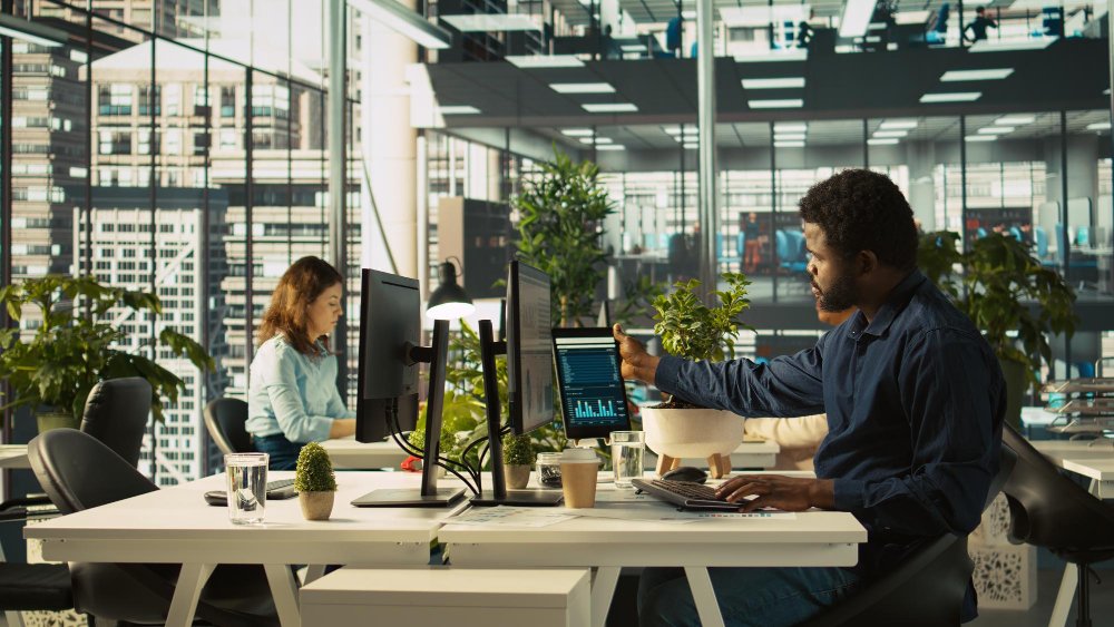 Vibrant Technologies team analyzing data on multiple screens